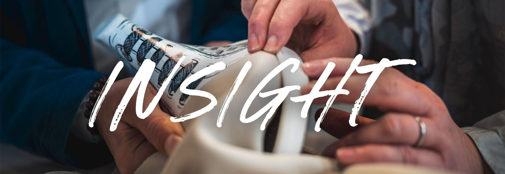 Close-up of hands carefully crafting a boot, with the word 'Insight' overlayed.