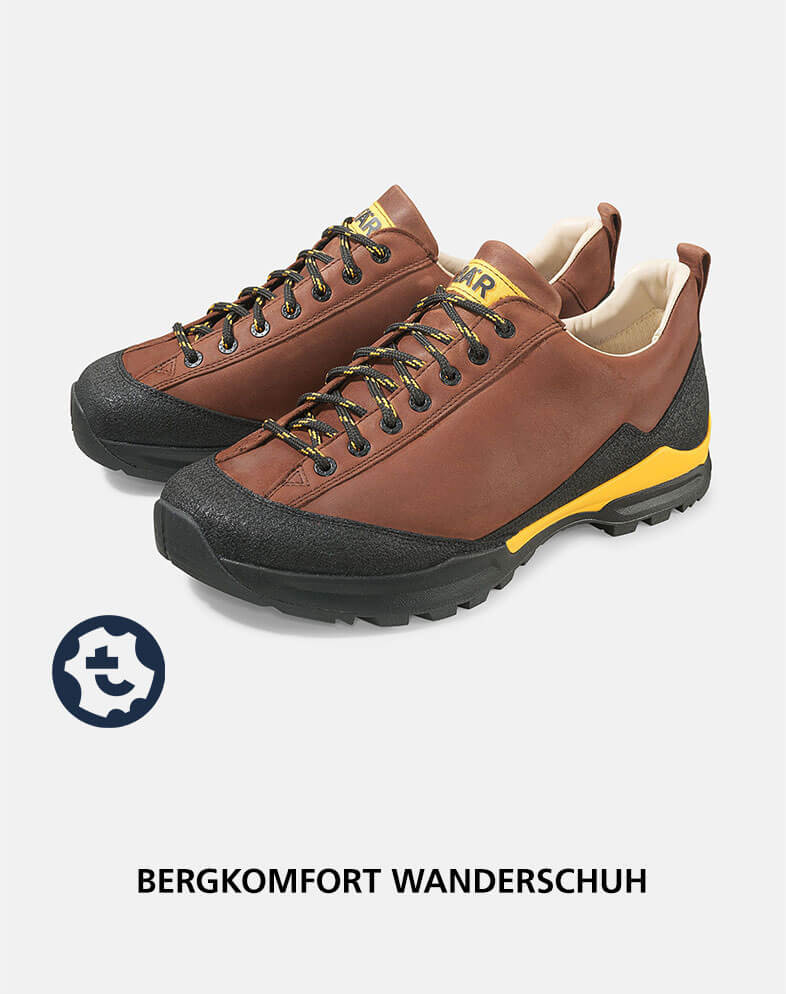 Bergkomfort Wanderschuh in Braun-Schwarz mit gelben Akzenten Robuster brauner Wanderschuh mit schwarzer Gummisohle und gelben Details, ideal für Outdoor-Abenteuer