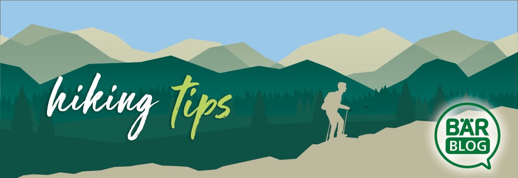 Hiking Tips Banner - BÄR Blog Illustrated banner featuring hiking tips and the BÄR Blog logo, showing a silhouette of a hiker in a mountainous landscape.