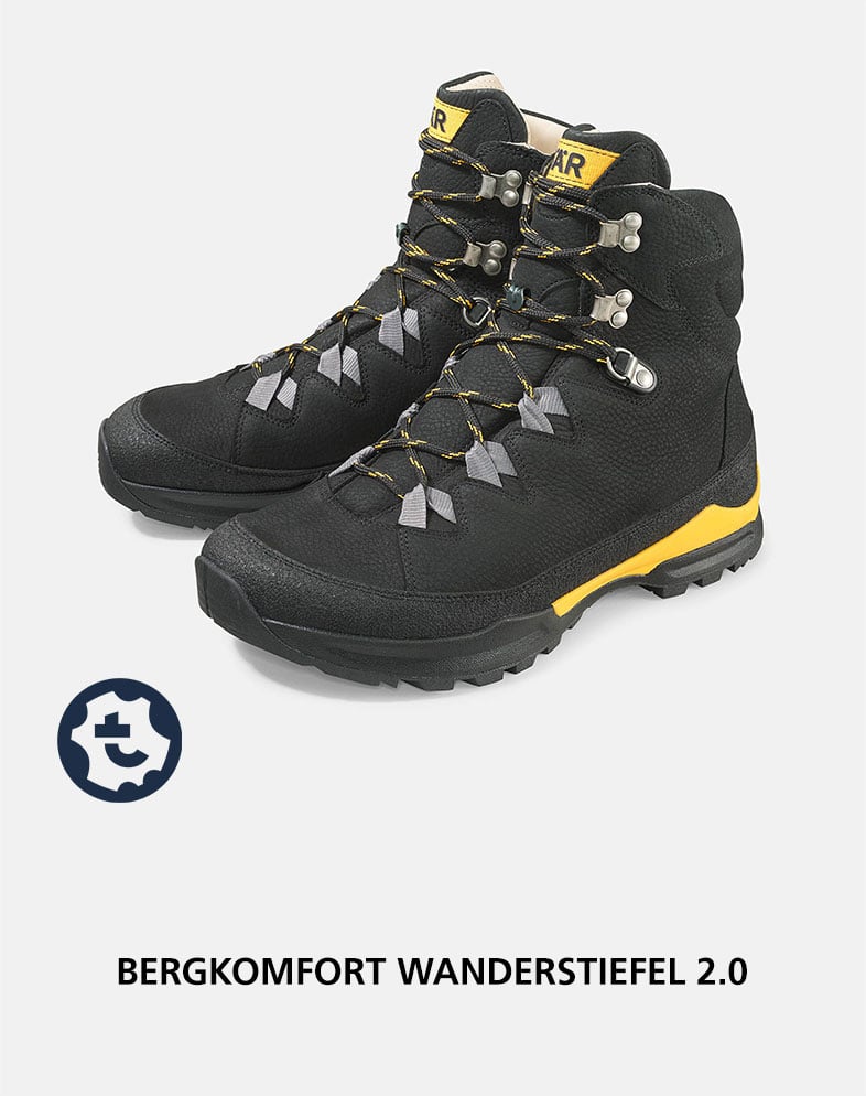 Bergkomfort Wanderstiefel 2.0 - Schwarz-Gelb Schwarze Wanderstiefel mit gelben Akzenten und robustem Profil, ideal für Bergwanderungen.