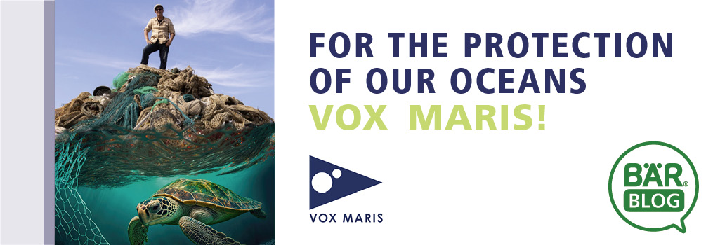 Protect Our Oceans with Vox Maris Image of a person standing on a pile of nets above water with a turtle swimming below, promoting ocean conservation by Vox Maris.