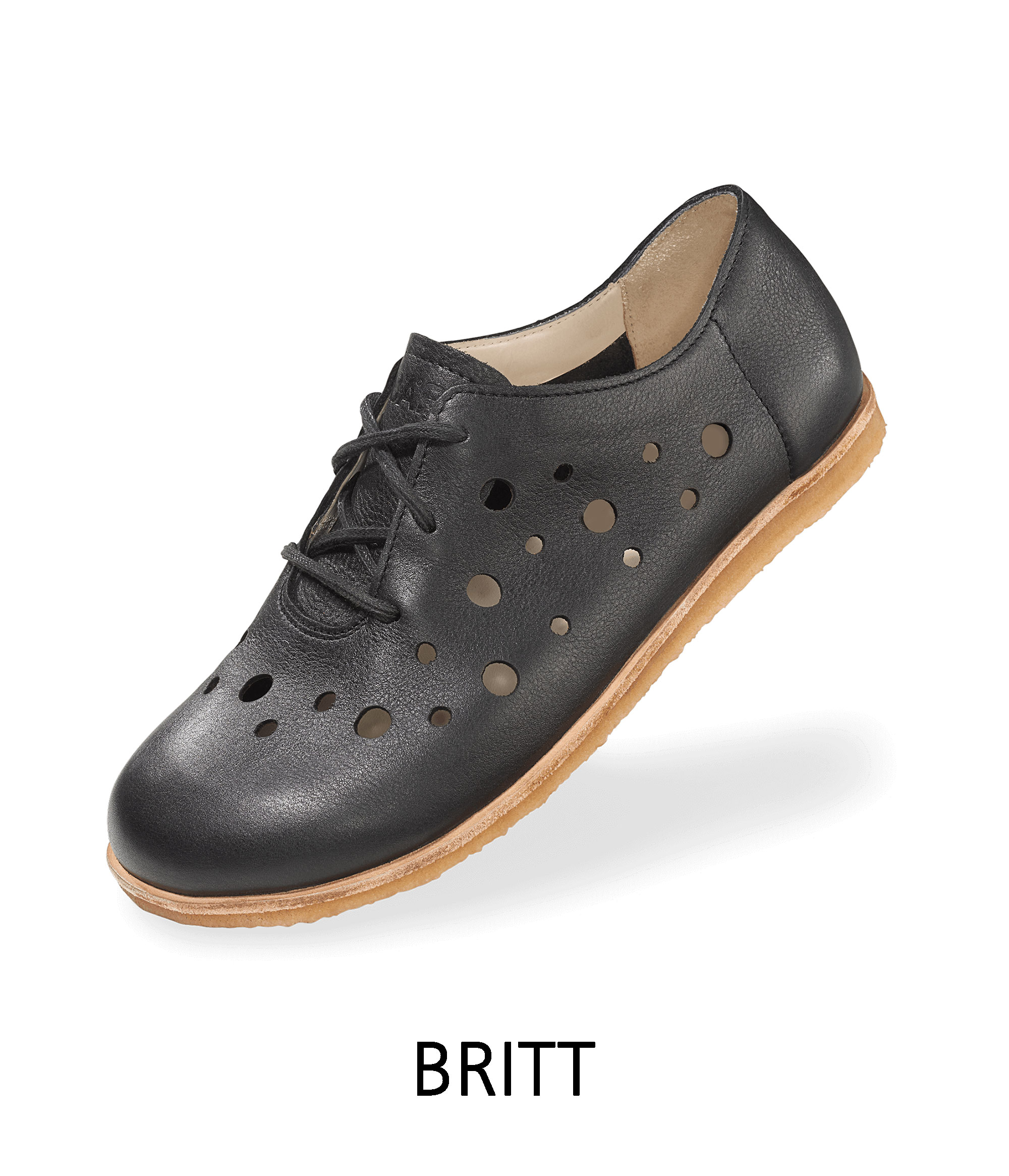 Stylish black leather shoe with perforated design A black leather shoe with round perforations and a tan sole, labeled 'BRITT'