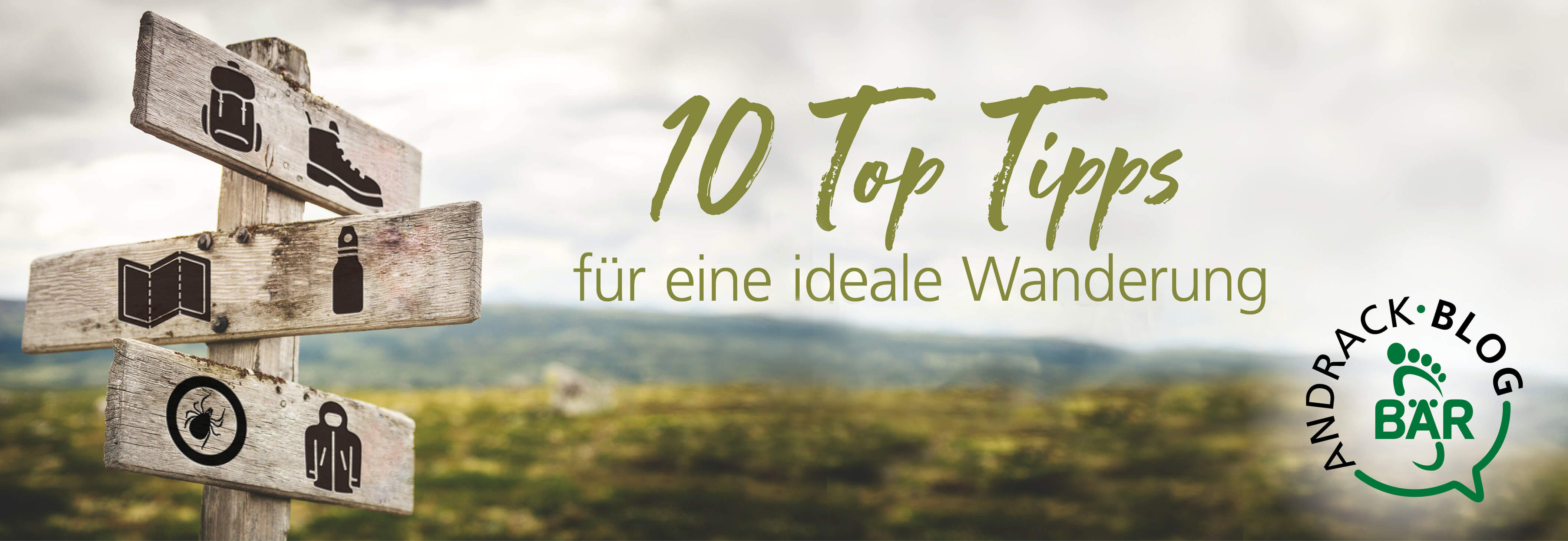 10 Top Tips for an Ideal Hike - Andreack Blog Wooden signpost with hiking icons and text '10 Top Tips for an Ideal Hike' in a scenic landscape