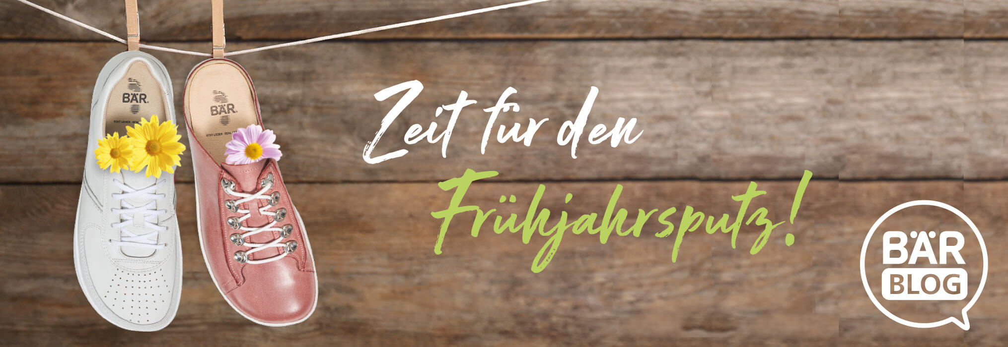 Spring Cleaning Shoes with Flowers Decoration Two shoes with flowers hanging on a line, with the text 'Zeit für den Frühjahrsputz!' translated as 'Time for Spring Cleaning!'