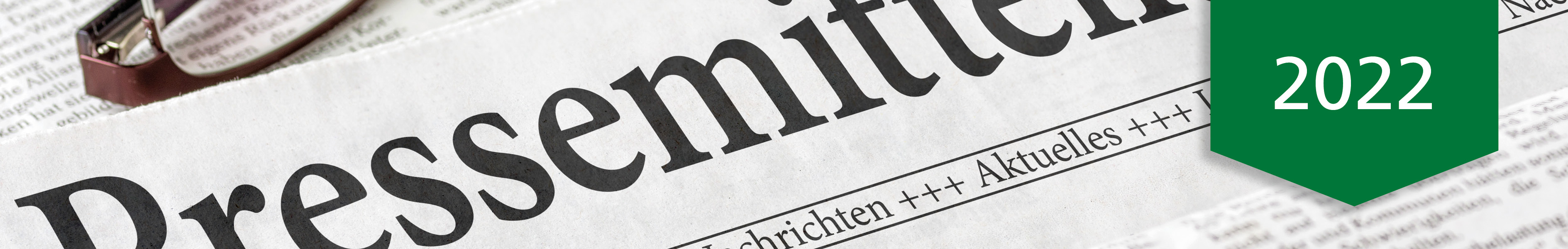 Pressemitteilung 2022 - Neuigkeiten und aktuelle Informationen Zeitungsausschnitt mit dem Wort 'Pressemitteilung' und einem Banner mit der Jahreszahl 2022