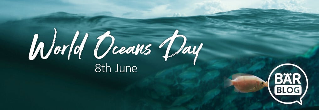 Ocean wave with a fish and the text 'World Oceans Day 8th June BÄR Blog'