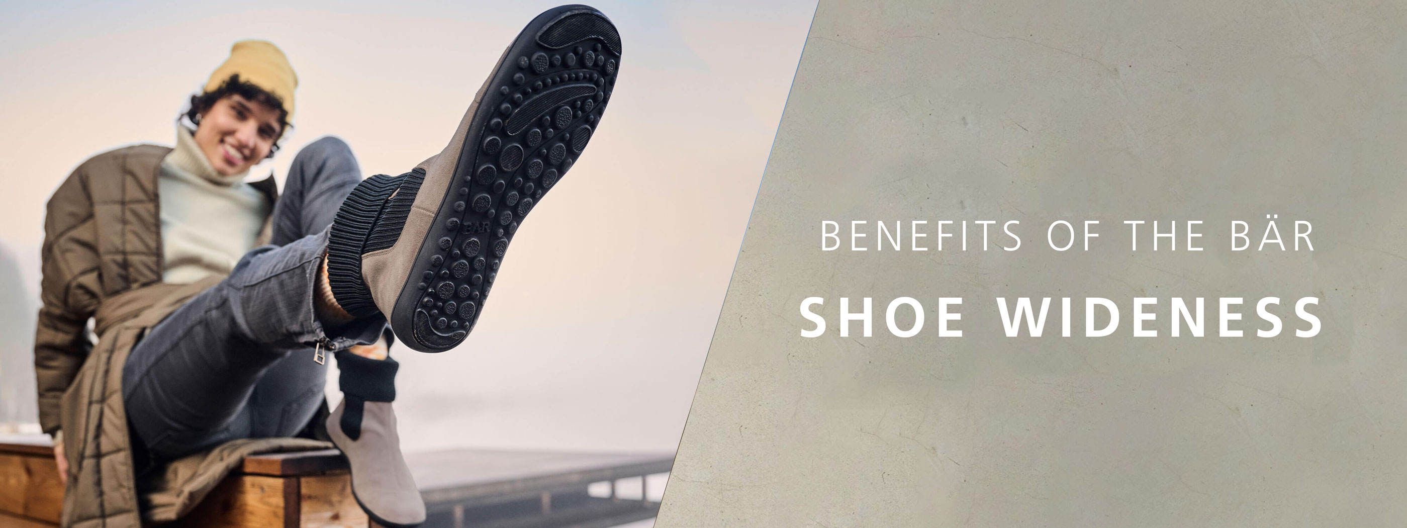 Comfortable and stylish shoes emphasizing width benefits Person showcasing the sole of a wide Bär shoe for comfort
