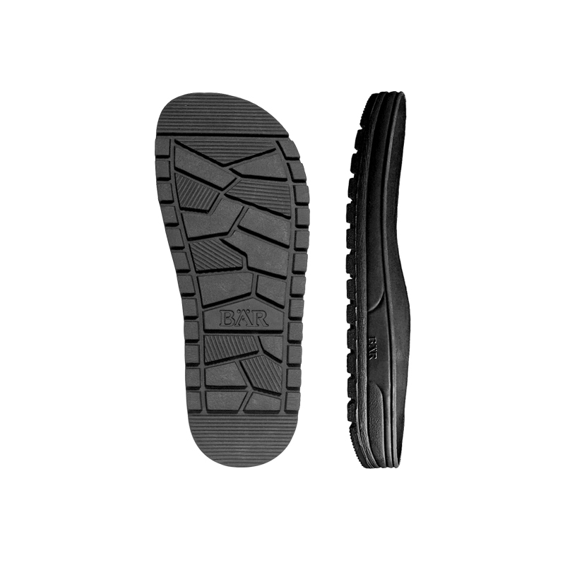 Schwarze Schuhsohlen mit rutschfester Profilierung Schwarze Schuhsohlen mit BÄR-Logo und rutschfestem Profil
