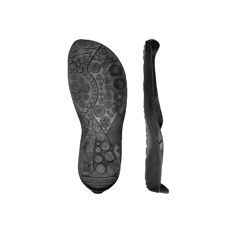 Profilansicht einer schwarzen Schuhsohle mit rutschfestem Design Schuhsohle mit rutschfestem Profil in Schwarz